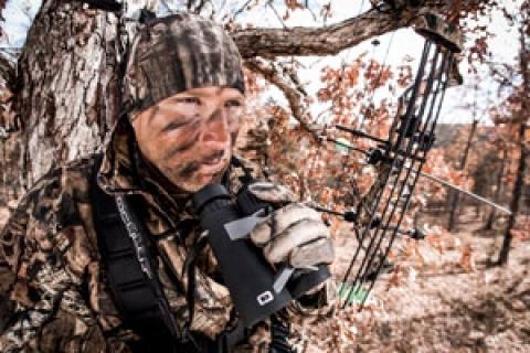 hunter using binoculars